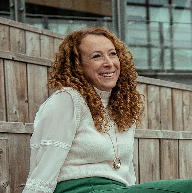 Financial planner Amy Gray has found an intriguing way to combine her two very different businesses